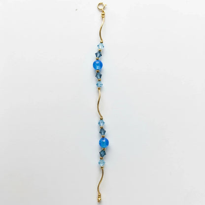 14k Yellow Gold Baby Bracelet made with Opal and Crystals from Swarovski