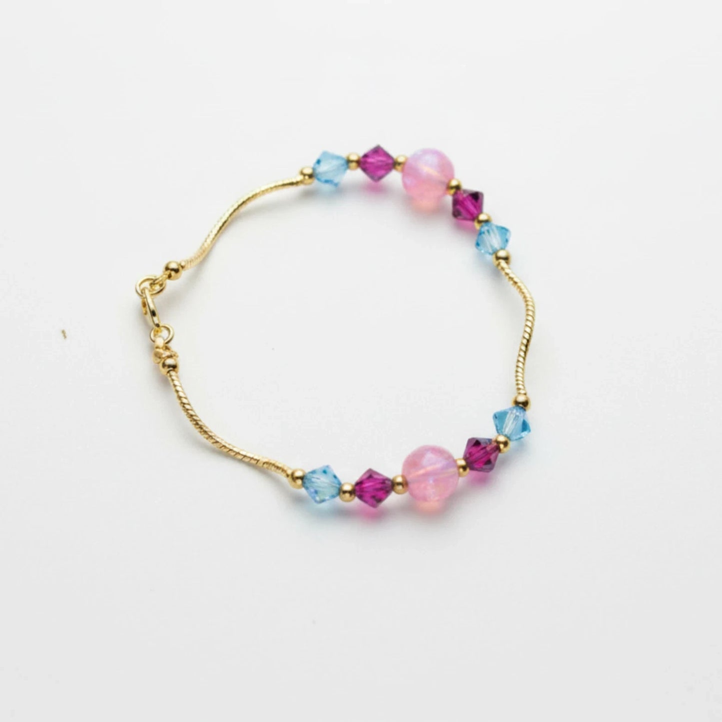 14k Yellow Gold Baby Bracelet made with Opal and Crystals from Swarovski
