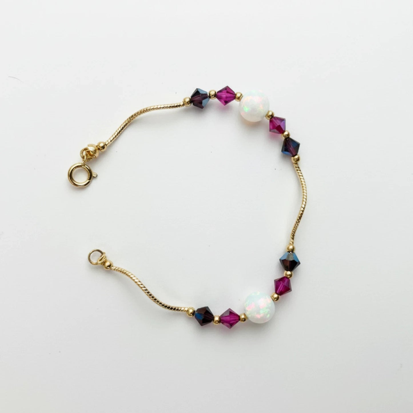 14k Yellow Gold Baby Bracelet made with Opal and Crystals from Swarovski