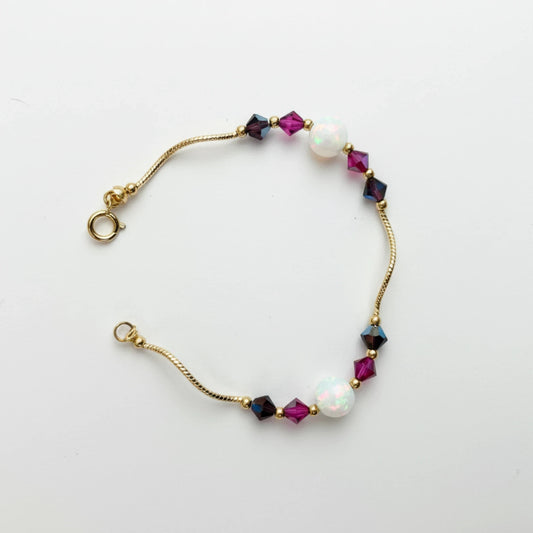 14k Yellow Gold Baby Bracelet made with Opal and Crystals from Swarovski