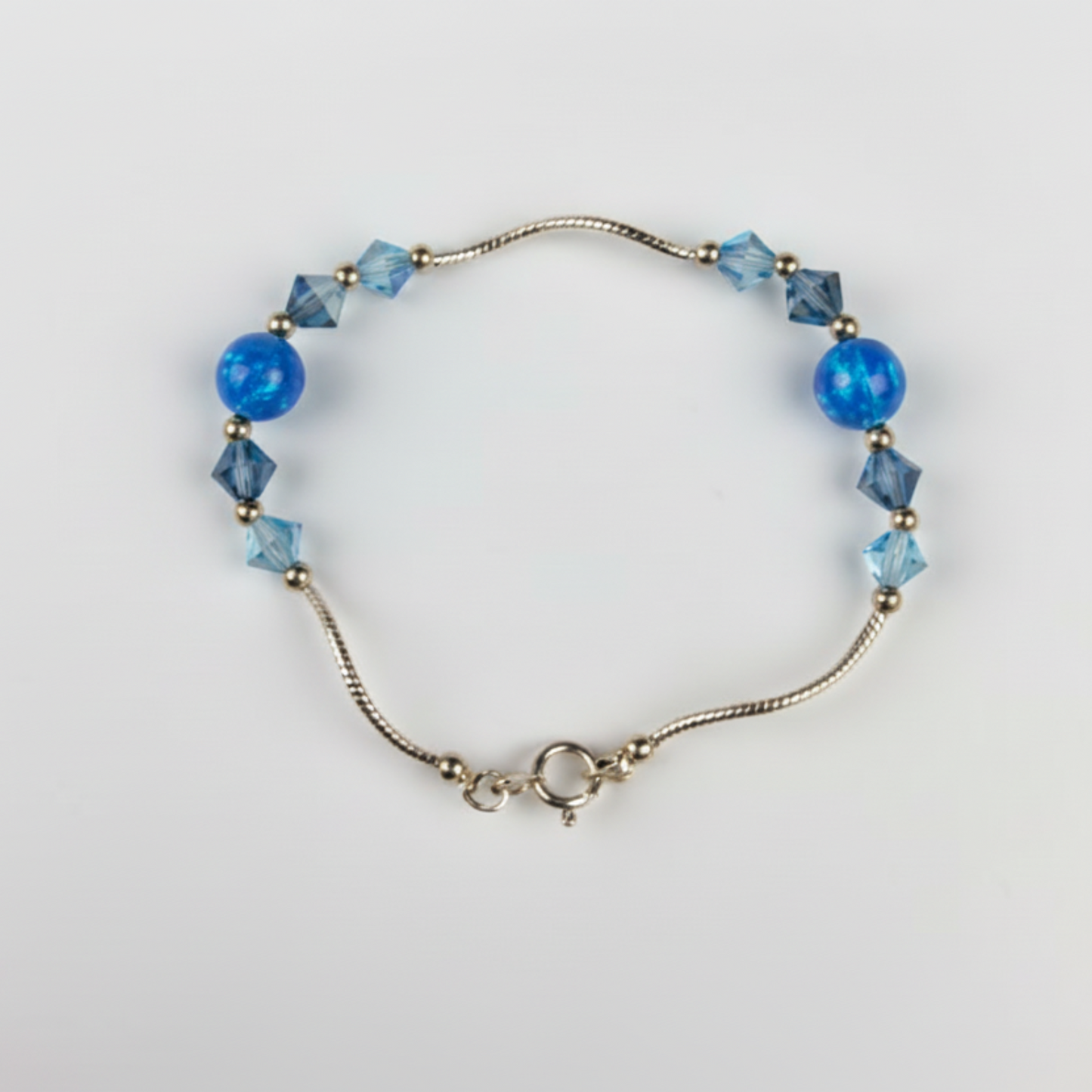 14k Yellow Gold Baby Bracelet made with Opal and Crystals from Swarovski