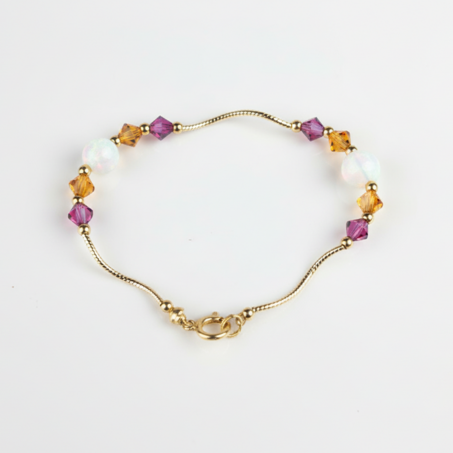 14k Yellow Gold Baby Bracelet made with Opal and Crystals from Swarovski