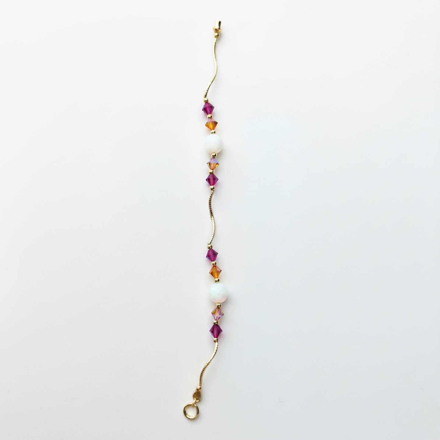 14k Yellow Gold Baby Bracelet made with Opal and Crystals from Swarovski