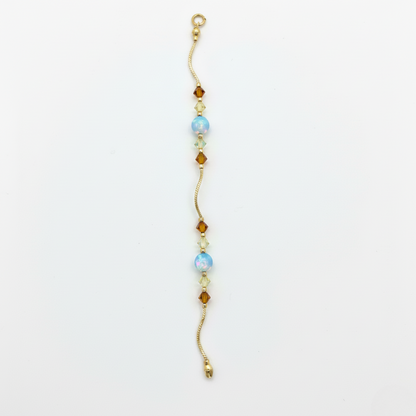 14k Yellow Gold Baby Bracelet made with Opal and Crystals from Swarovski