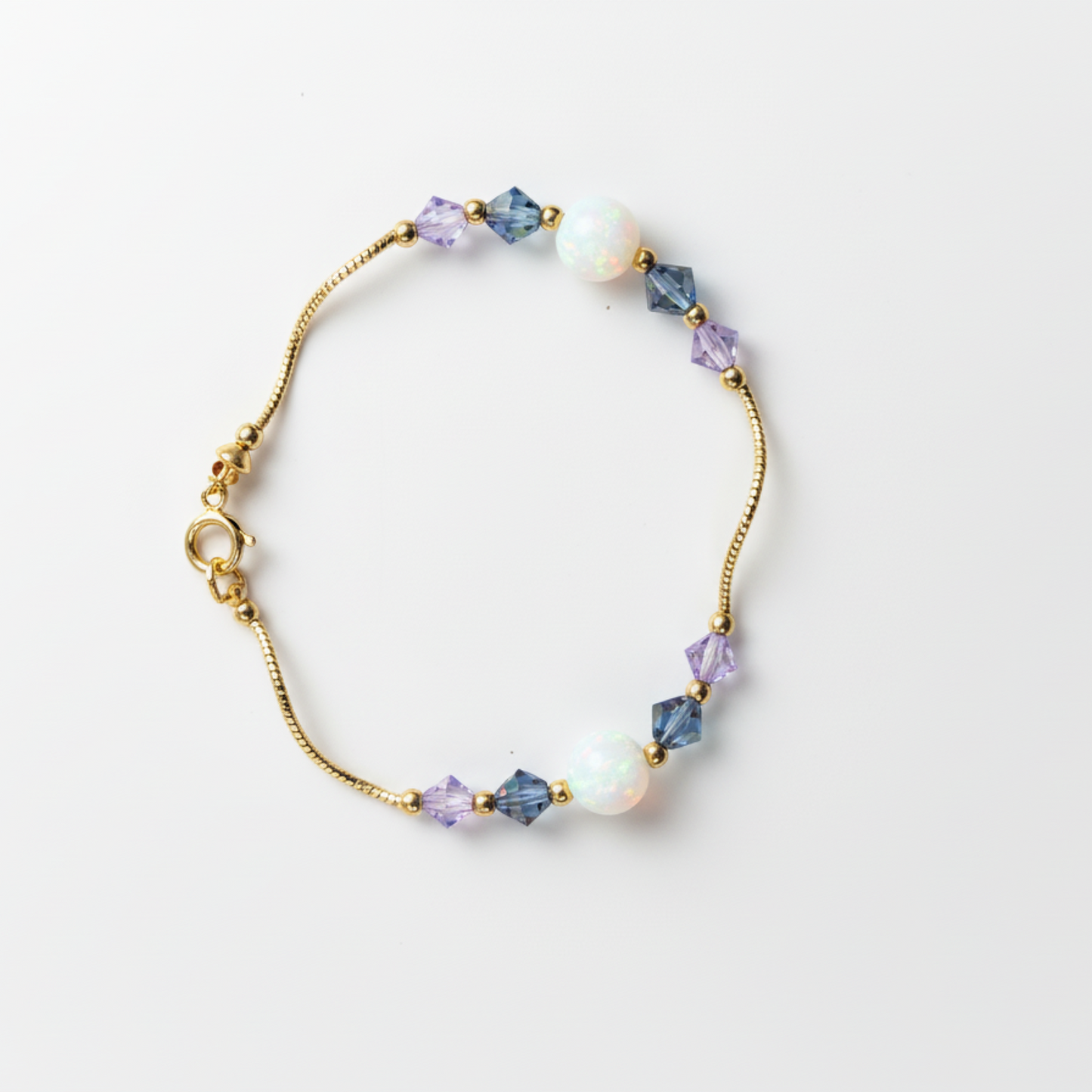 14k Yellow Gold Baby Bracelet made with Opal and Crystals from Swarovski