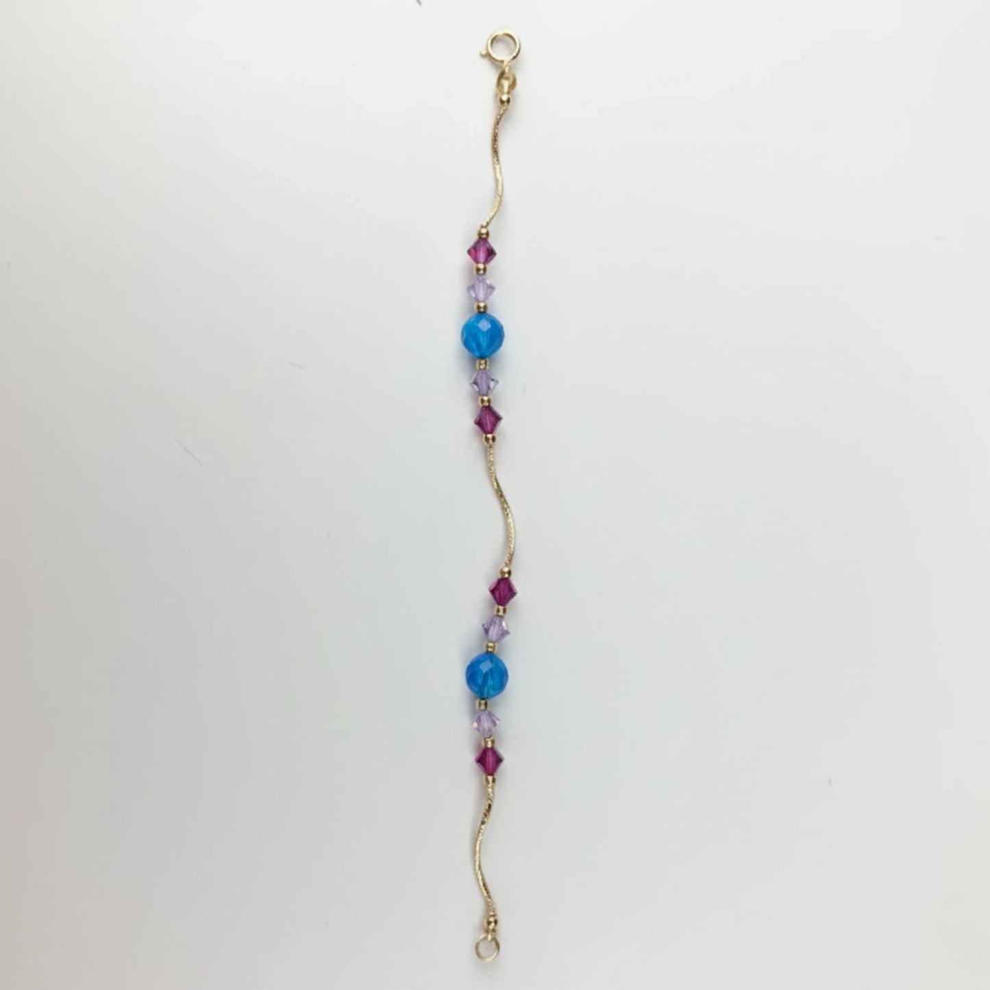 14k Yellow Gold Baby Bracelet made with Opal and Crystals from Swarovski