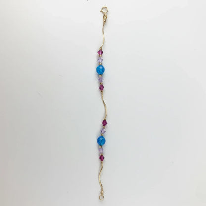 14k Yellow Gold Baby Bracelet made with Opal and Crystals from Swarovski