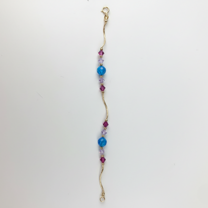14k Yellow Gold Baby Bracelet made with Opal and Crystals from Swarovski