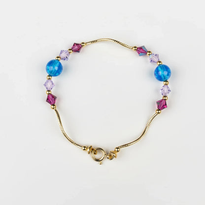 14k Yellow Gold Baby Bracelet made with Opal and Crystals from Swarovski