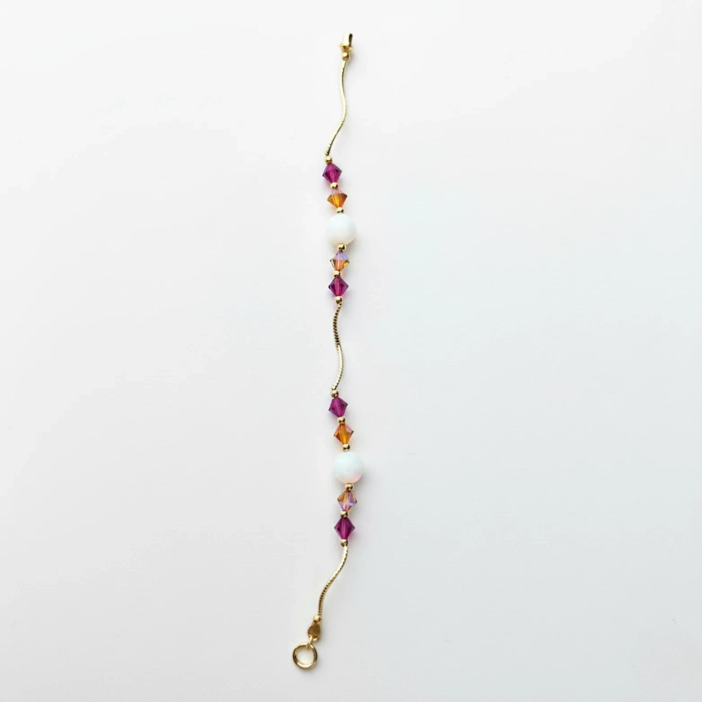 14k Yellow Gold Baby Bracelet made with Opal and Crystals from Swarovski