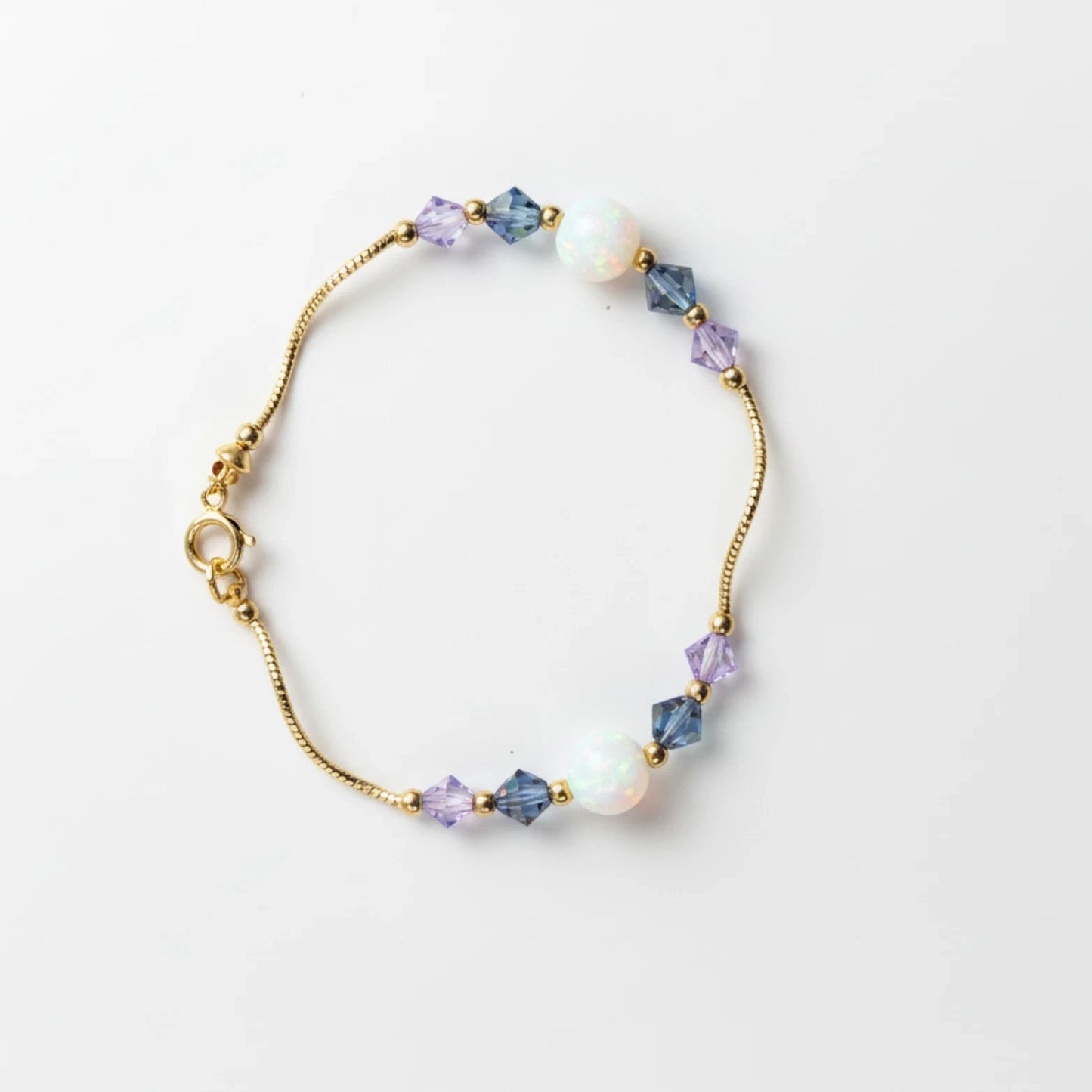 14k Yellow Gold Baby Bracelet made with Opal and Crystals from Swarovski