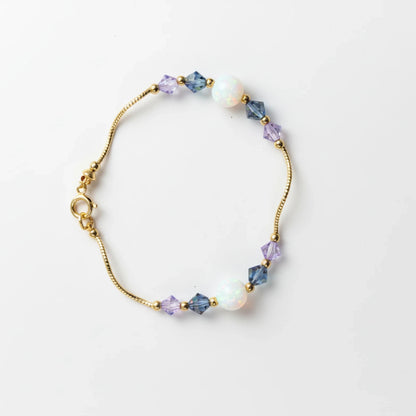 14k Yellow Gold Baby Bracelet made with Opal and Crystals from Swarovski