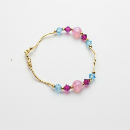 14k Yellow Gold Baby Bracelet made with Opal and Crystals from Swarovski
