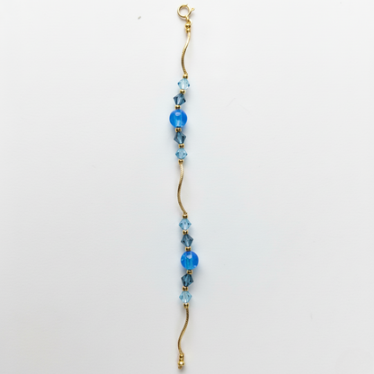 14k Yellow Gold Baby Bracelet made with Opal and Crystals from Swarovski