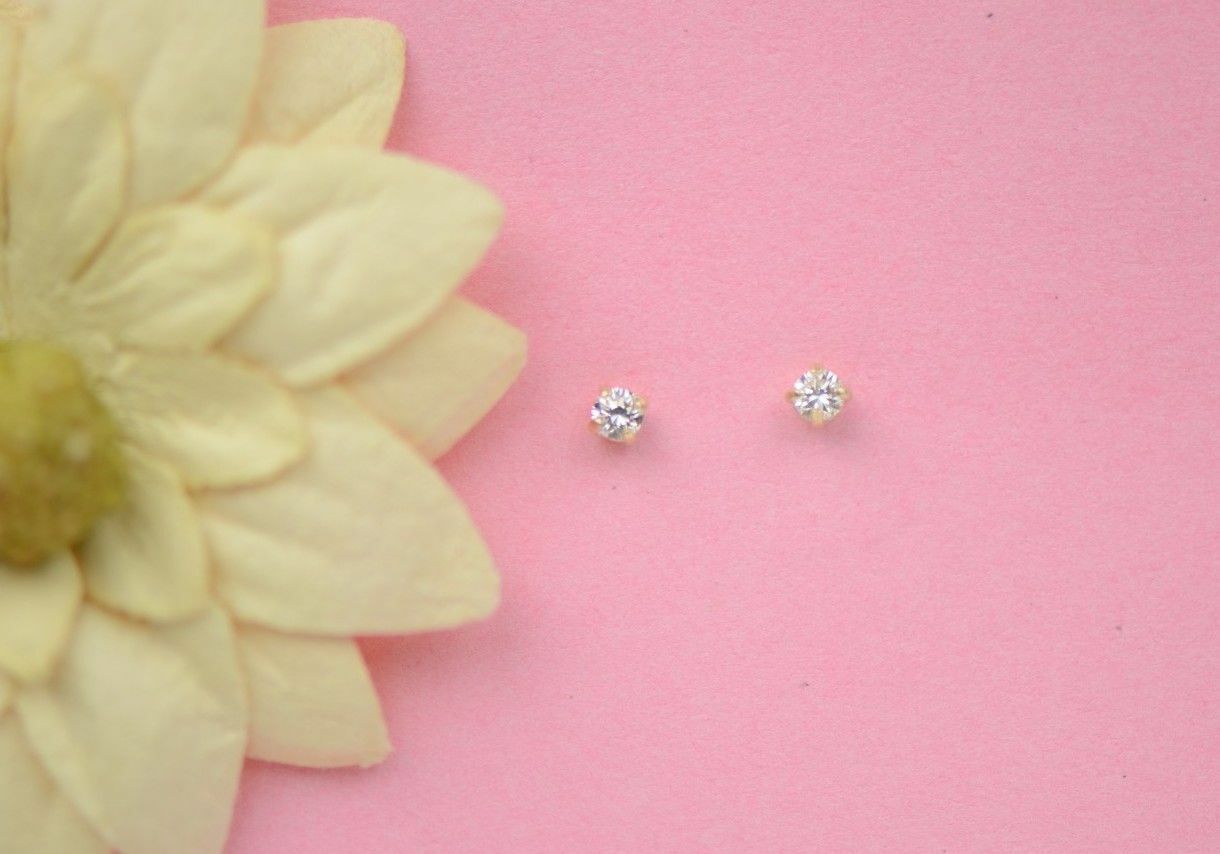 CZ Stud Earring Round cut in 14k yellow gold Screw back