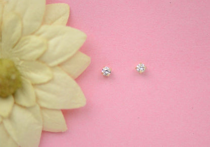 CZ Stud Earring Round cut in 14k yellow gold Screw back