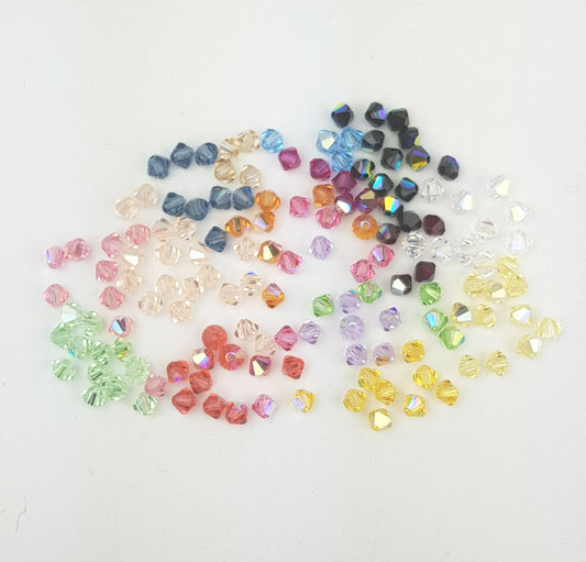 144x SWAROVSKI 5328 CRYSTAL AB 4mm BICONE XILION BEAD
