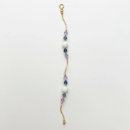 14k Yellow Gold Baby Bracelet made with Opal and Crystals from Swarovski