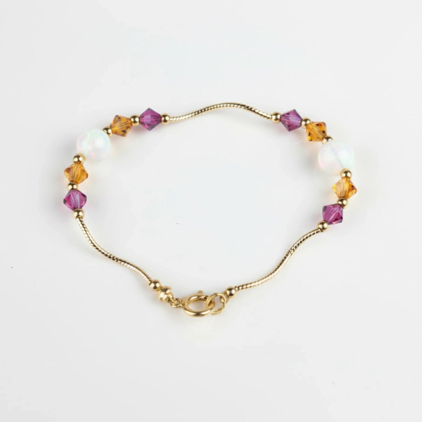 14k Yellow Gold Baby Bracelet made with Opal and Crystals from Swarovski