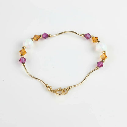 14k Yellow Gold Baby Bracelet made with Opal and Crystals from Swarovski