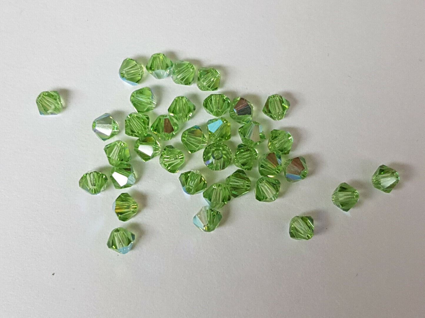 144x SWAROVSKI 5328 CRYSTAL AB 4mm BICONE XILION BEAD