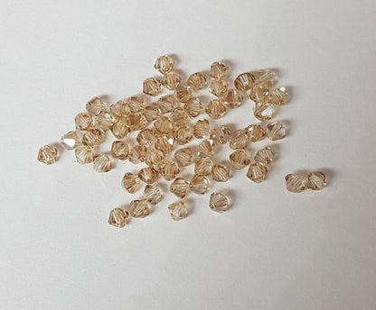 144x SWAROVSKI 5328 CRYSTAL AB 4mm BICONE XILION BEAD