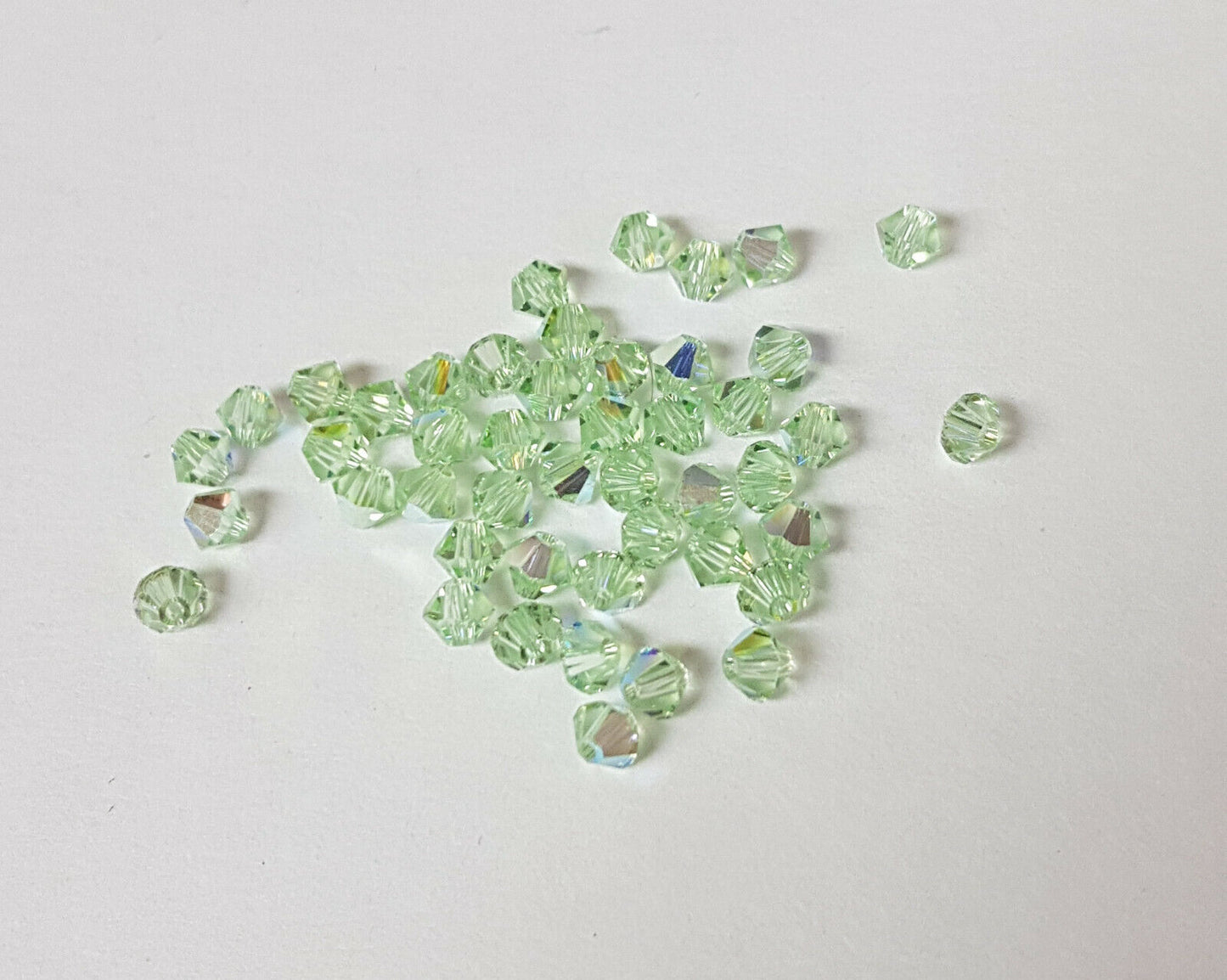 144x SWAROVSKI 5328 CRYSTAL AB 4mm BICONE XILION BEAD