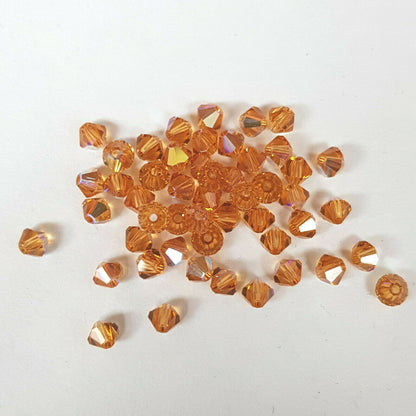 144x SWAROVSKI 5328 CRYSTAL AB 4mm BICONE XILION BEAD