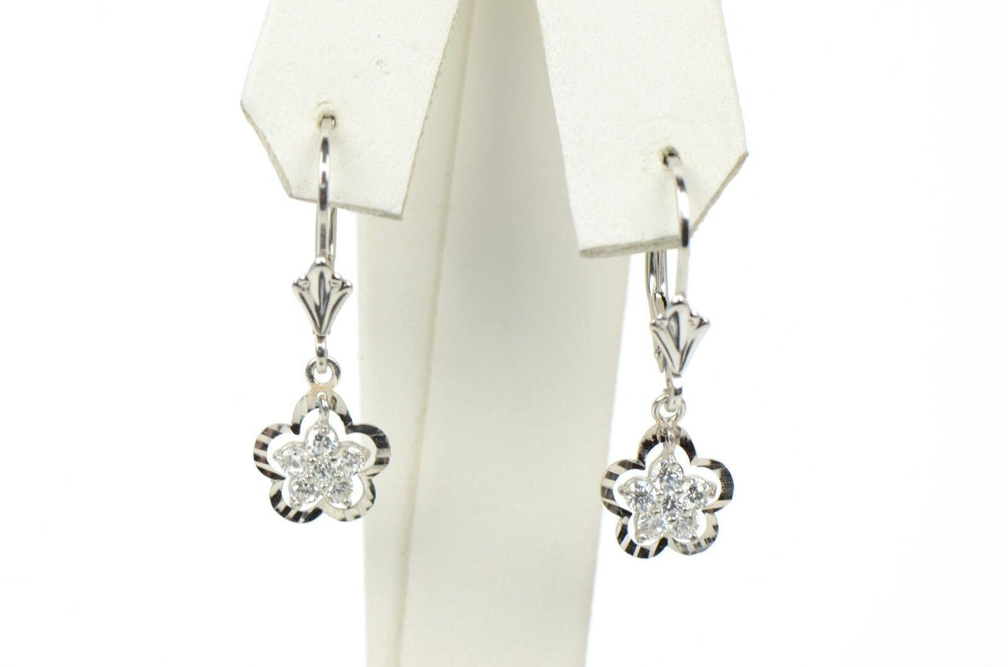 Sterling Silver flower shaped dangle earrings with stone