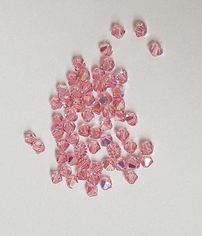 144x SWAROVSKI 5328 CRYSTAL AB 4mm BICONE XILION BEAD